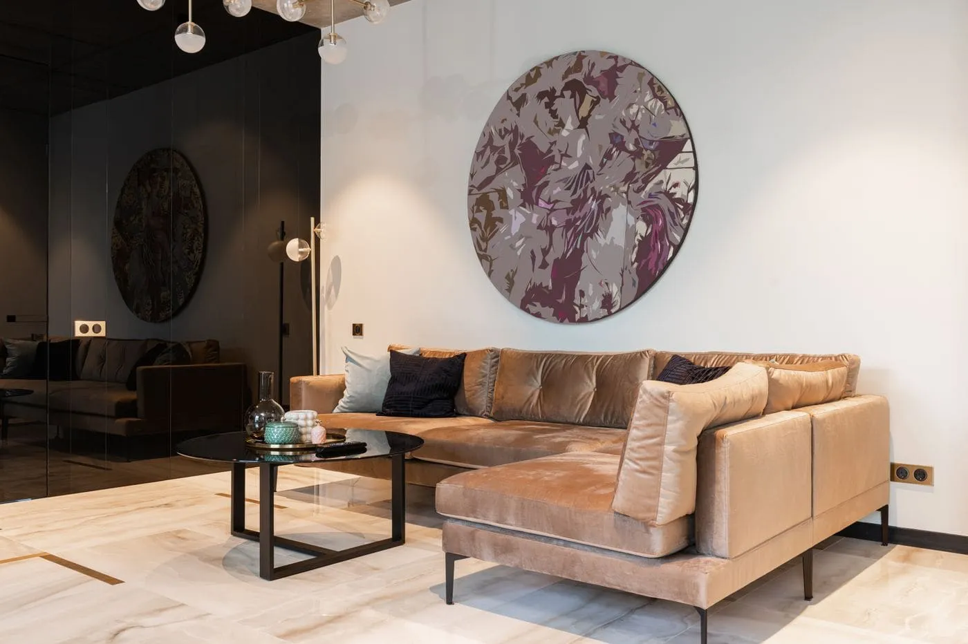 A picture rail hook holding framed art on cord in a period UK flat living room